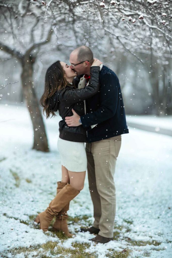 couple kissing in the snow