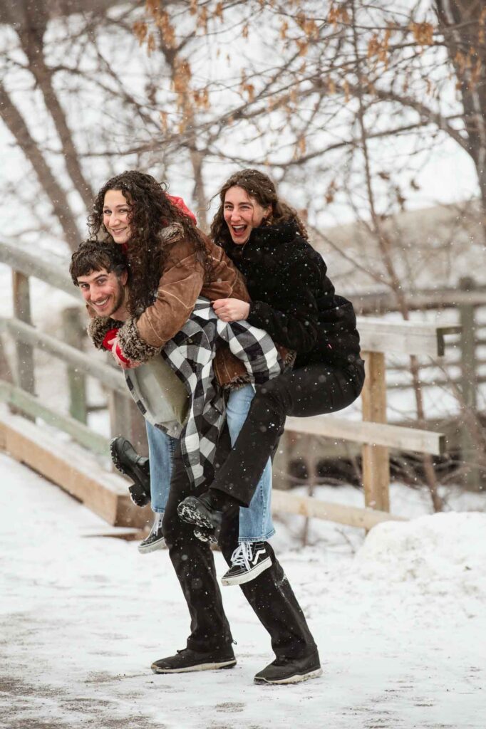 siblings piggyback riding