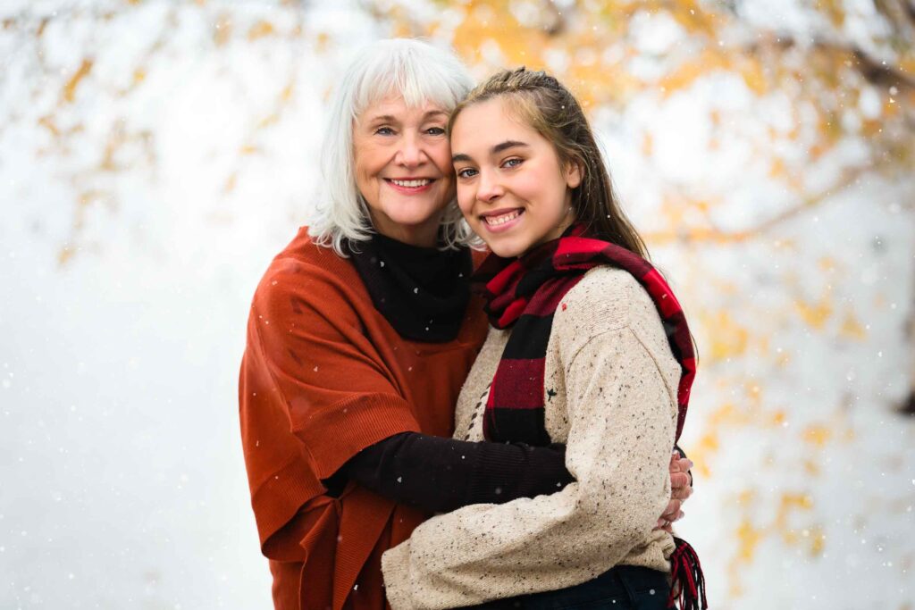 grandma and grand daughter in the snow