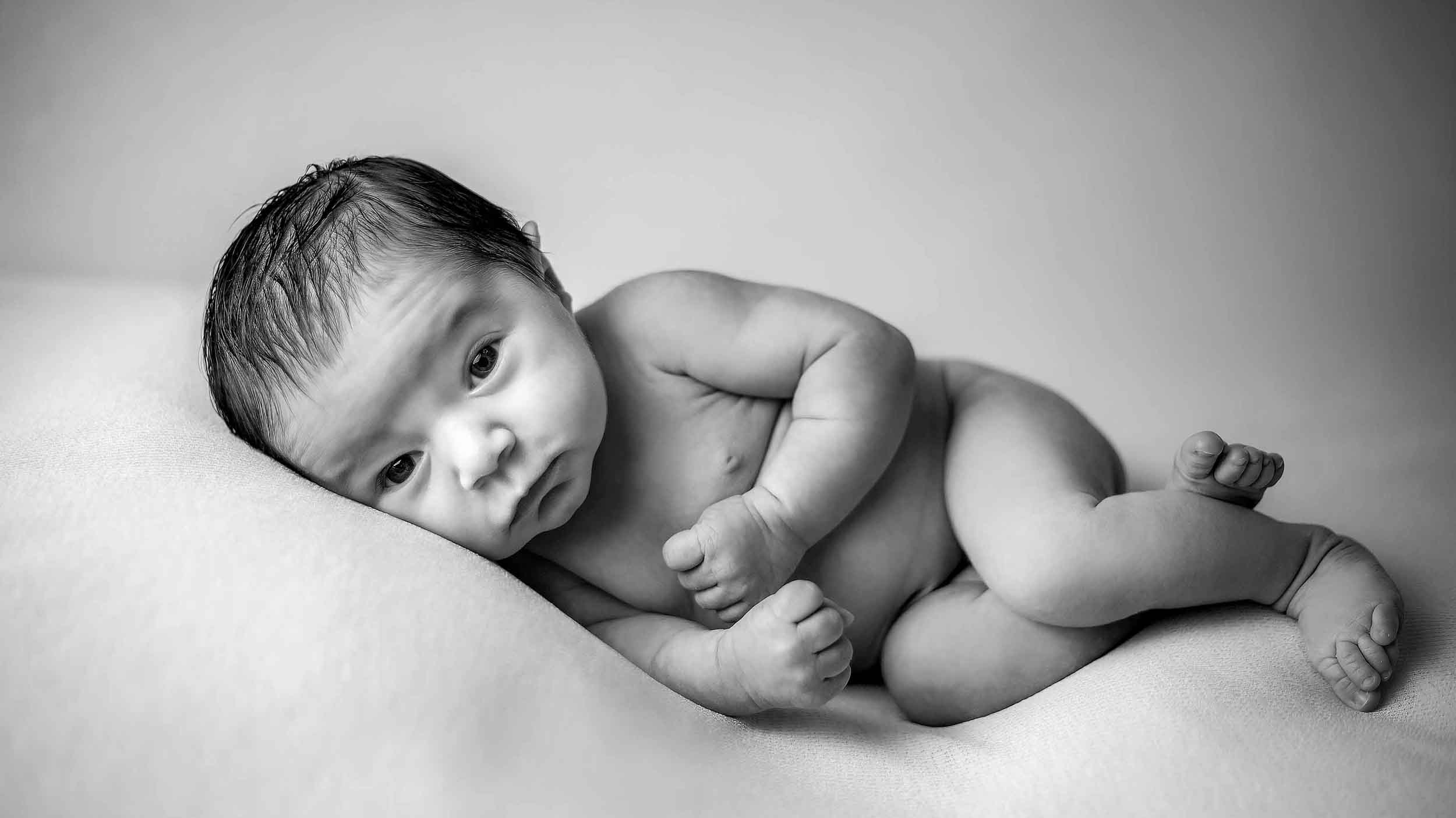 newborn baby with open eyes